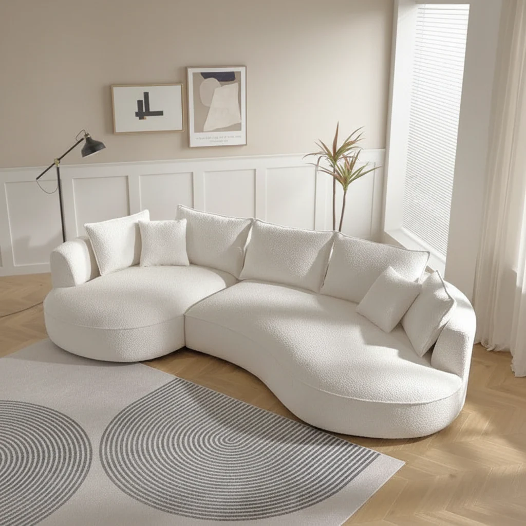 Studio Spectrum custom curved modern sofa in light beige performance fabric